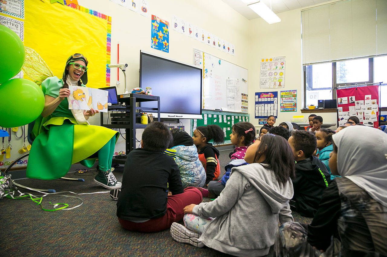 The Tooth Fairy shares a story with kindergartners. COURTESY, Ben VanHouten of VanHouten Photography