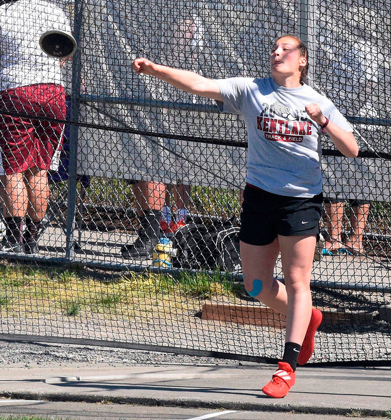 Kentlake’s Jordan Fong flings the discus, one of the throwing events she excels at. RACHEL CIAMPI, Reporter