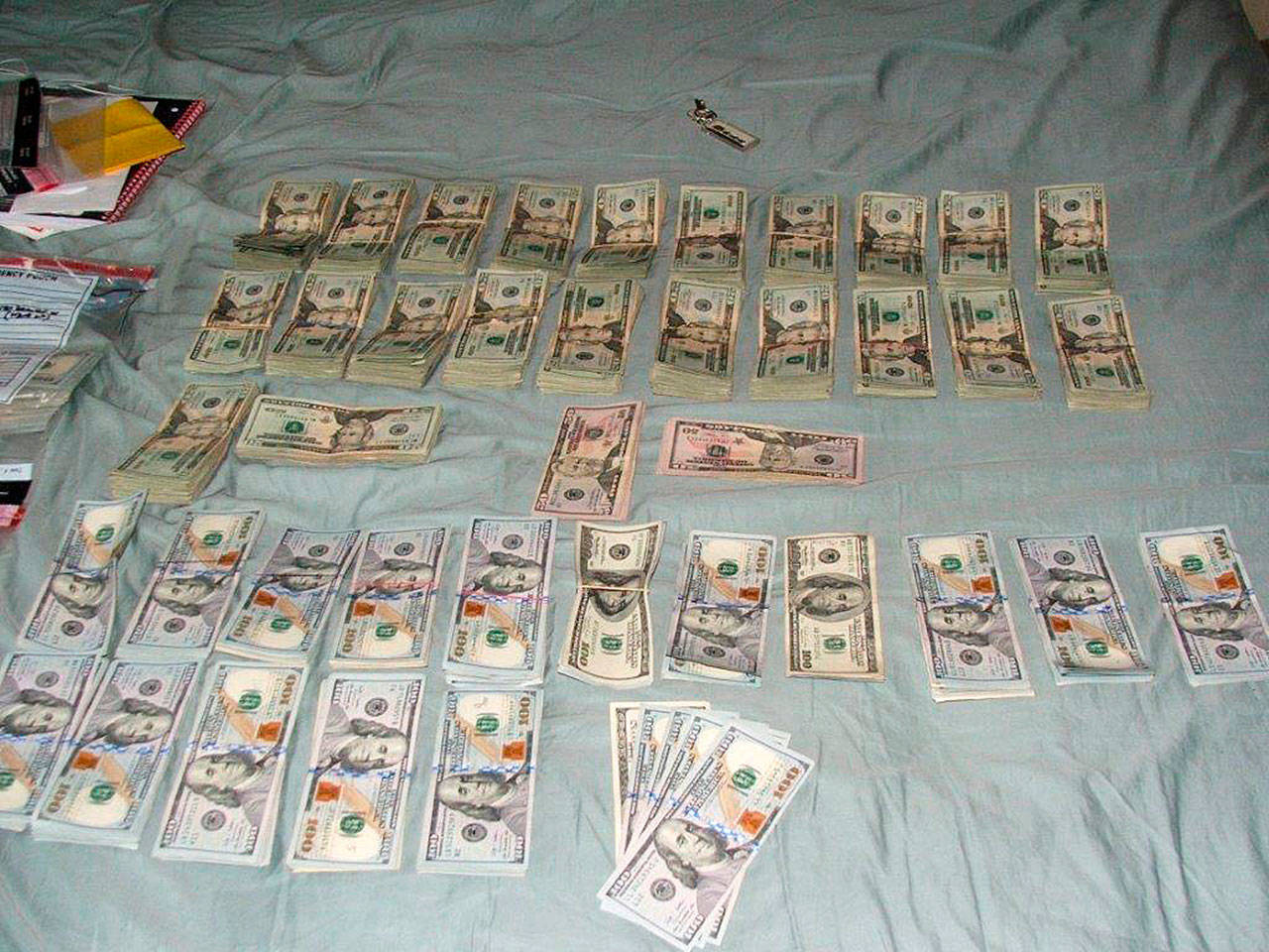Cash recovered by the King County Sheriff’s Office during drug raids April 13 in King, Pierce and Thurston counties. COURTESY PHOTO, Sheriff’s Office