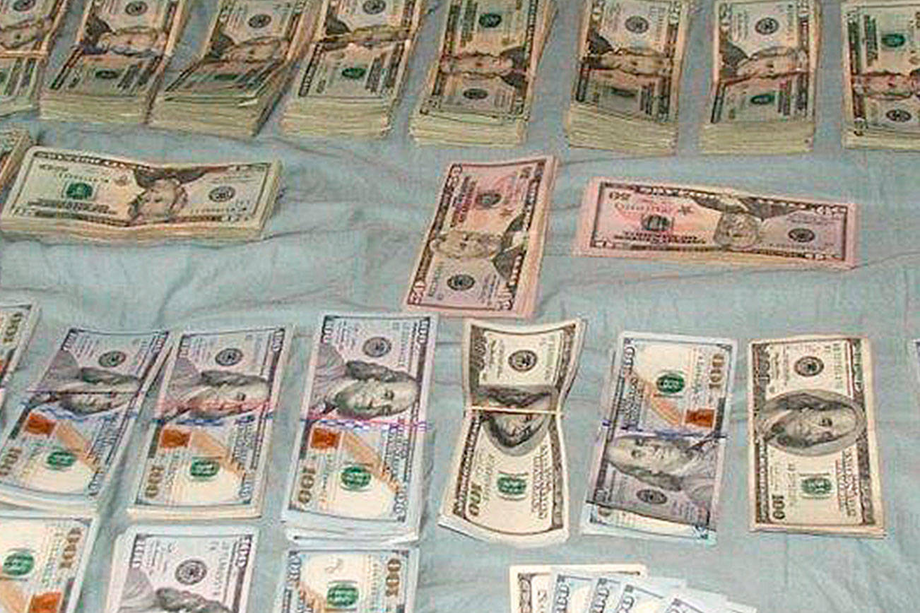 King County Sheriff’s Office seizes $250,000 cash, guns and drugs during tri-county raids