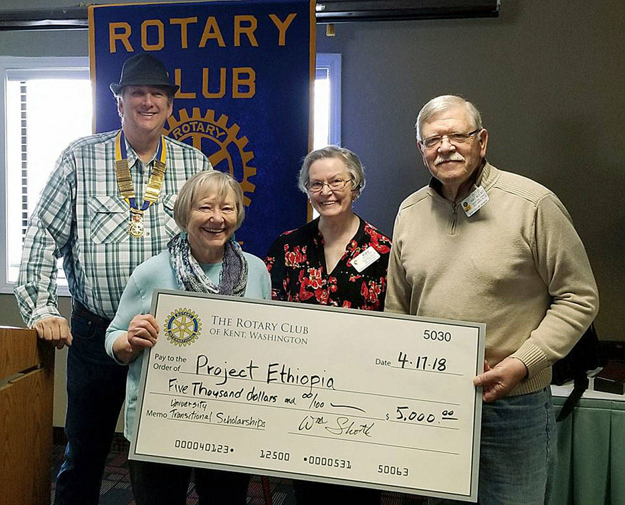 At the presentation are, from left, Rotary Club President Billy Shott; Project Ethiopia spokesperson Lynnda Laurie; Rotarian Kay Cook; and International Committee chair Bob Nachlinger. COURTESY PHOTO