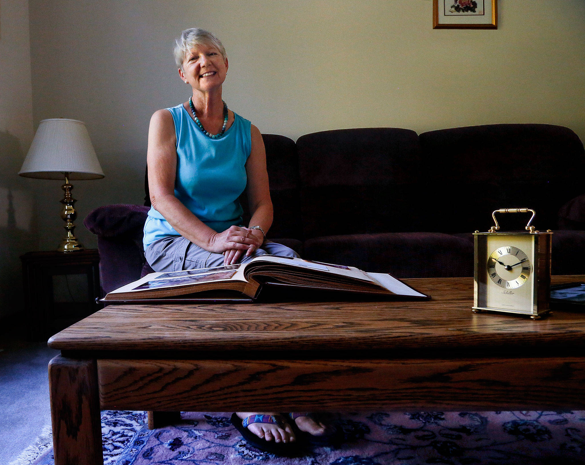 Snohomish’s Janette Huskie, who worked two years as a Buckingham Palace housemaid and met the future Princess Diana, gets out her scrapbook of memories and talks about Saturday’s royal wedding. (Dan Bates / The Herald)