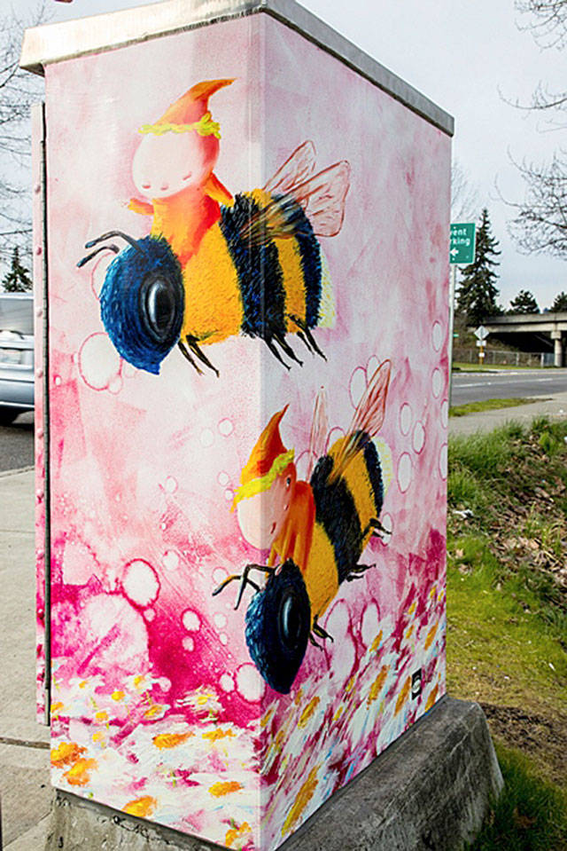 On West James Street at the Interurban Trail, Vikram Madan’s “Bumble Bee Brigade” carries elf-like riders across a bubble-gum pink sky. COURTESY PHOTO, City of Kent