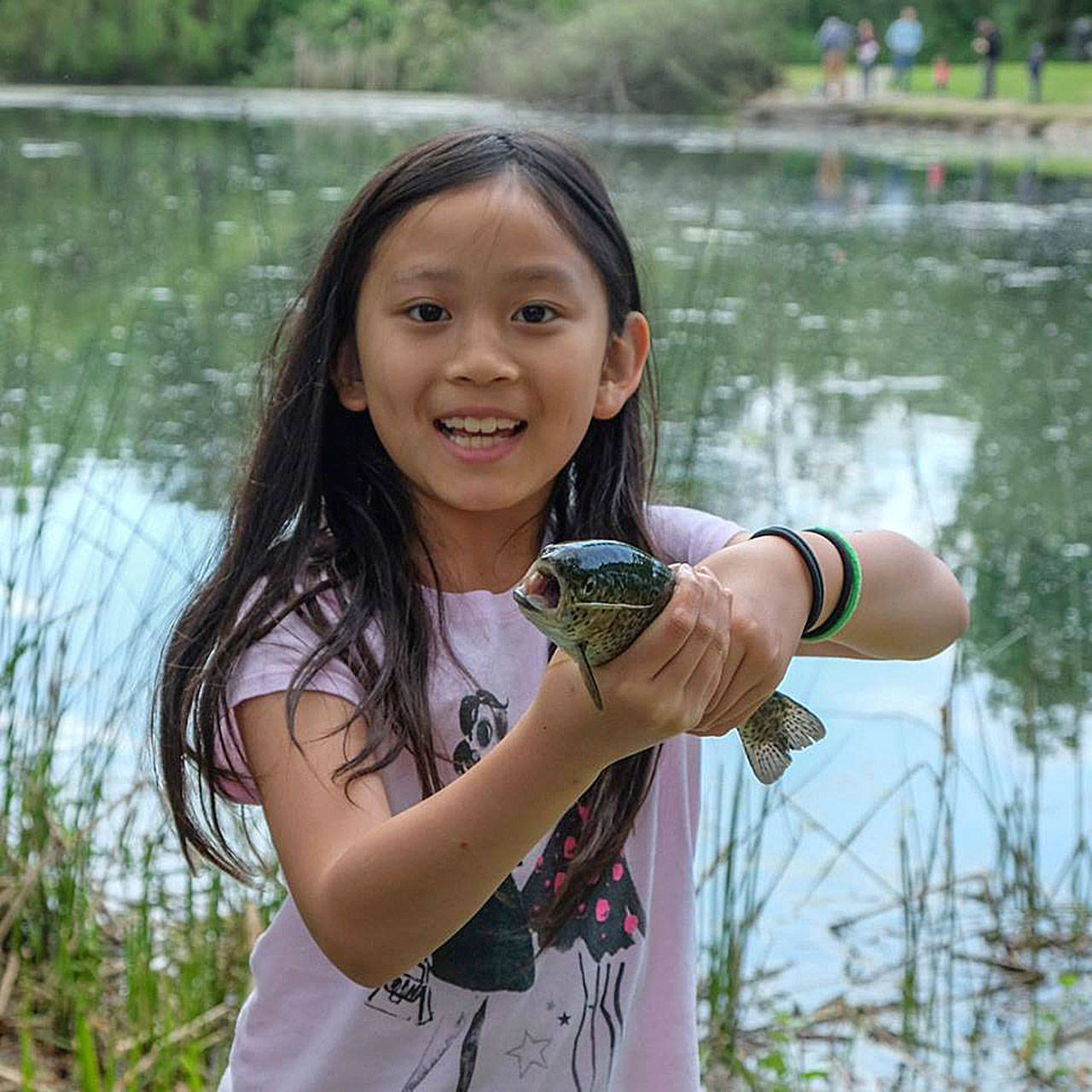 Kids got a chance to catch a fish at the May 12 event at the Old Fishing Hole. The city of Kent and the Rotary Club made the event possible. COURTESY PHOTO