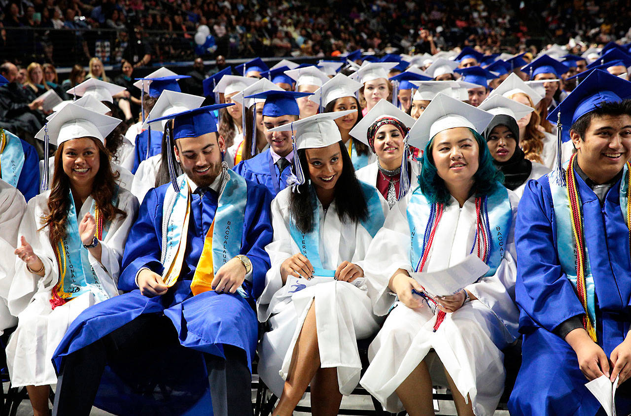 Kent-Meridian High graduates at the ShoWare Center in 2017. FILE PHOTO