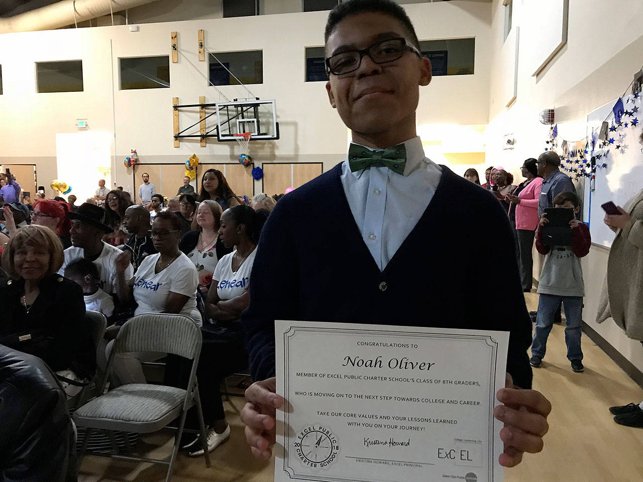 Noah Oliver shows off his eighth-grade graduation certificate from Kent’s Excel Public Charter School. The June 13 graduation marked the first for the third-year school. COURTESY PHOTO, Excel Public Charter School