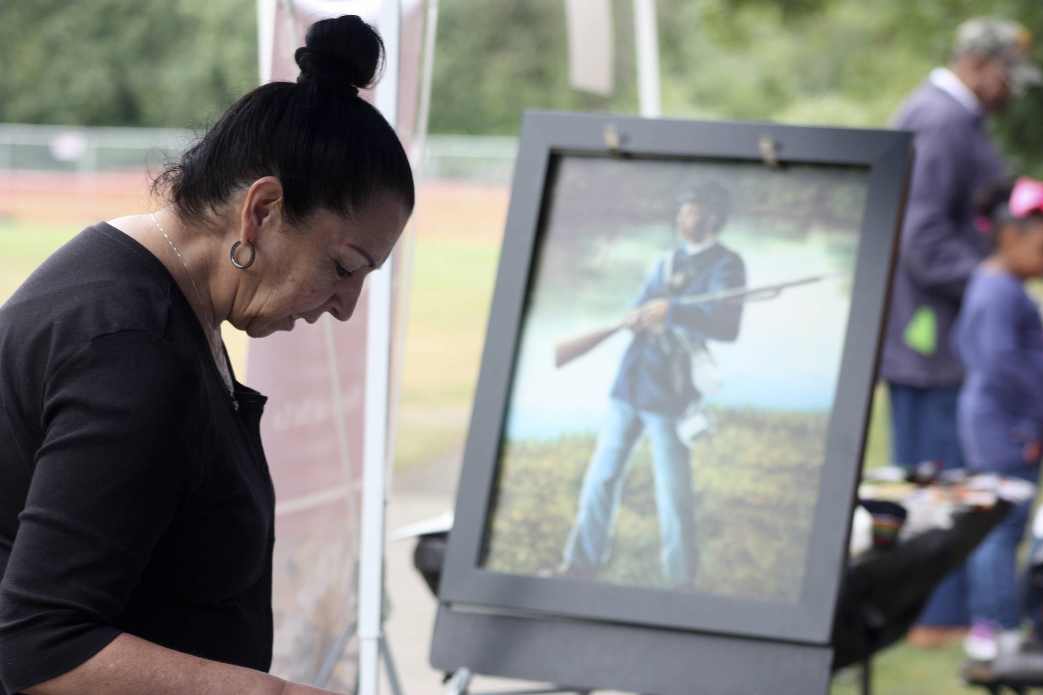 Art was among the items up for sale at the Juneteenth celebration at Morrill Meadows Park. MARK KLAAS, Kent Reporter