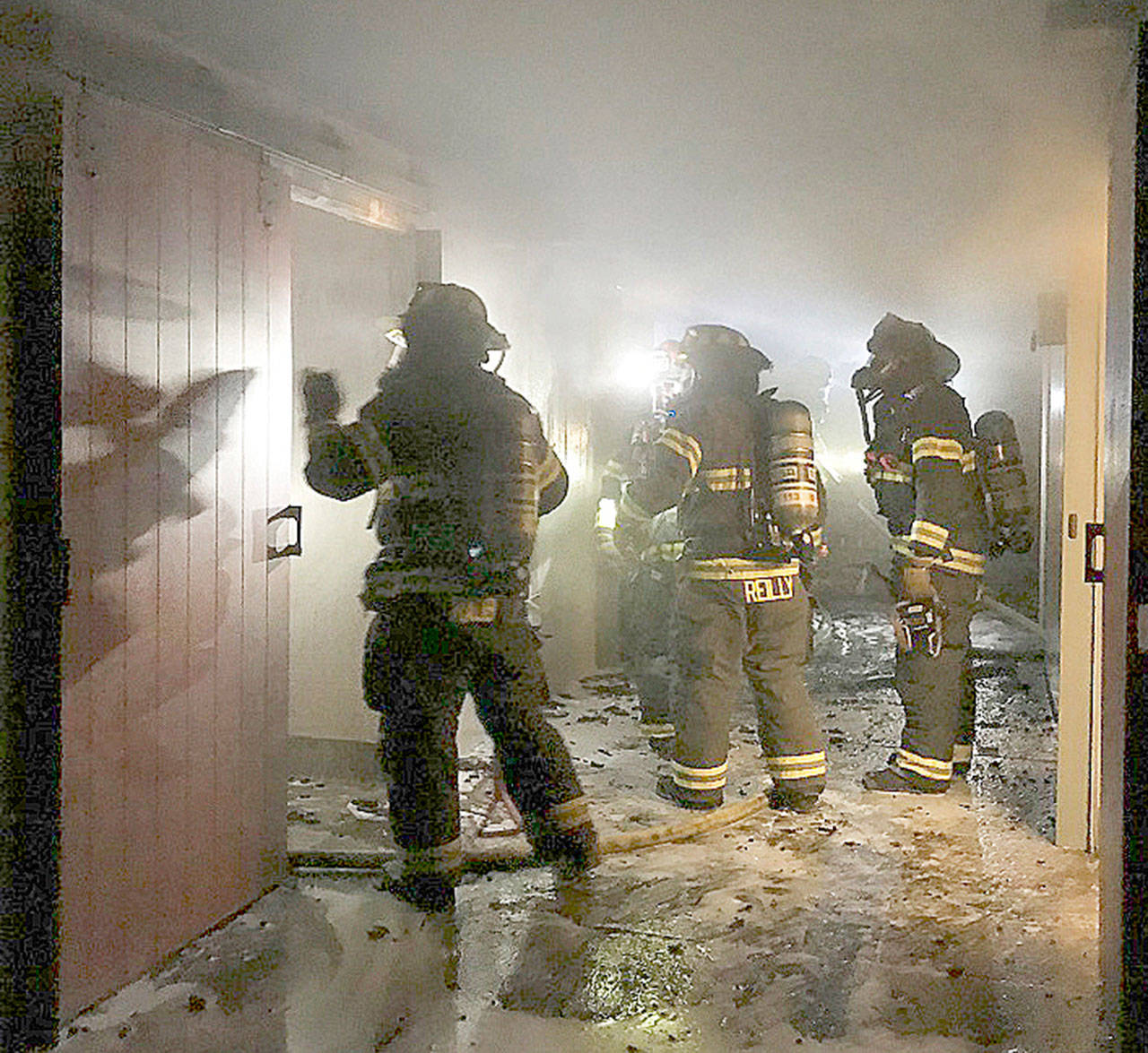 Firefighters attack a blaze at the main building Thursday at Lake Meridian Park. COURTESY PHOTO, Puget Sound Fire