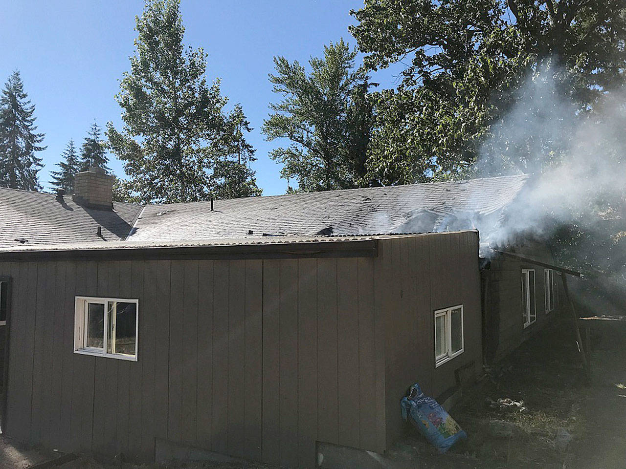 Fire damages a home Thursday in the 25300 block of 30th Avenue South on the West Hill. COURTESY PHOTO, Puget Sound RFA