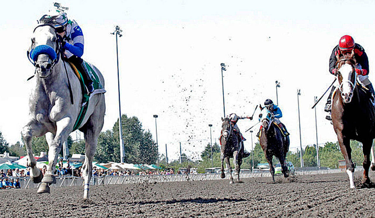Riser (left) holds off Barkley (far right) in the Mt. Rainier Stakes on Sunday at Emerald Downs in Auburn. COURTESY PHOTO, Emerald Downs
