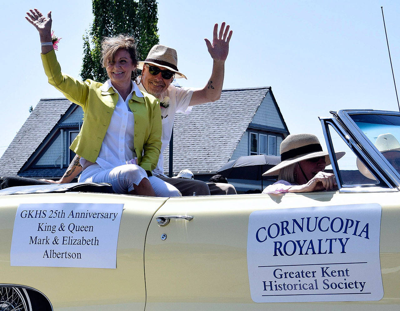 Mark and Elizabeth Albertson, the Cornucopia Days King and Queen, ride in the Sunday parade. RACHEL CIAMPI, Reporter