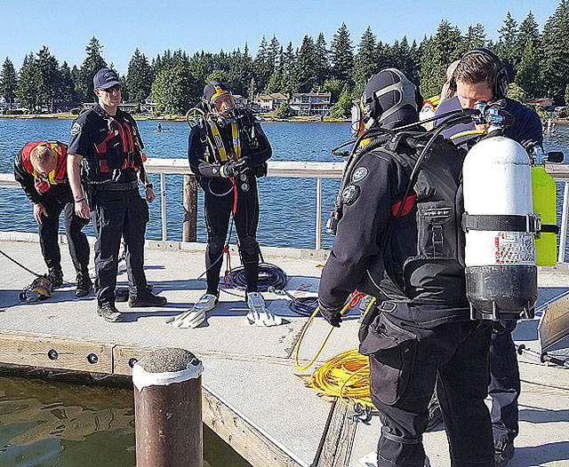 Divers respond to a possible drowning on Monday evening at Lake Meridian Park, but it turned out to be a false report. COURTESY PHOTO, Puget Sound Fire
