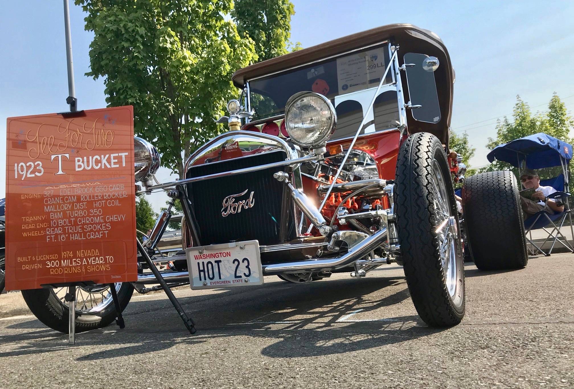 Auburn’s Nelson Brown sits by his pride and joy, a 1923 T-Bucket, which he and his wife, Sylvia, drive exclusively, about 300 miles, to hot rod runs and shows each year. Photos by MARK KLAAS, Kent Reporter
