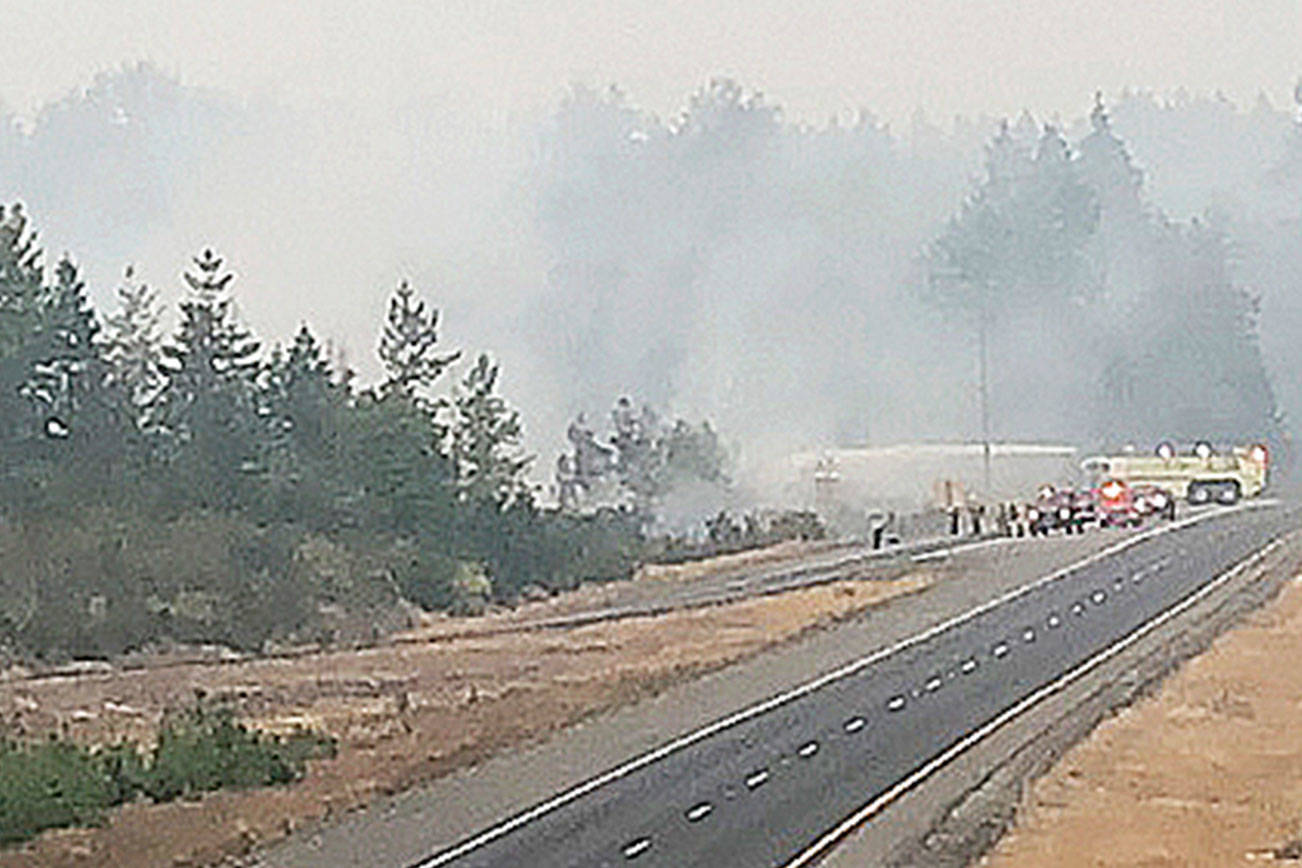 Crews wrap up brush fire near Highway 18