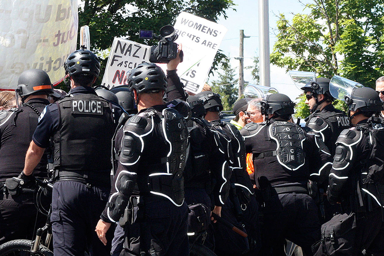 Police move demonstrators during a June 9 rally near the Kent Planned Parenthood clinic on the East Hill. FILE PHOTO, Mark Klaas