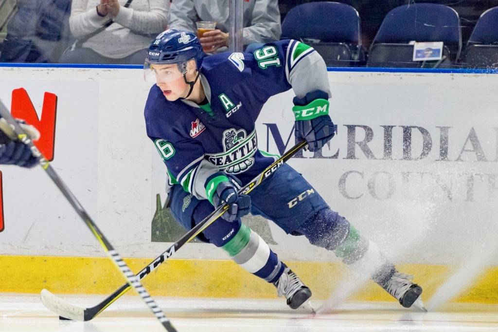 Thunderbirds center Noah Philp kicks up some ice as he advances the puck during WHL play against Tri-City on Saturday night. COURTESY PHOTO, Brian Liesse, T-Birds