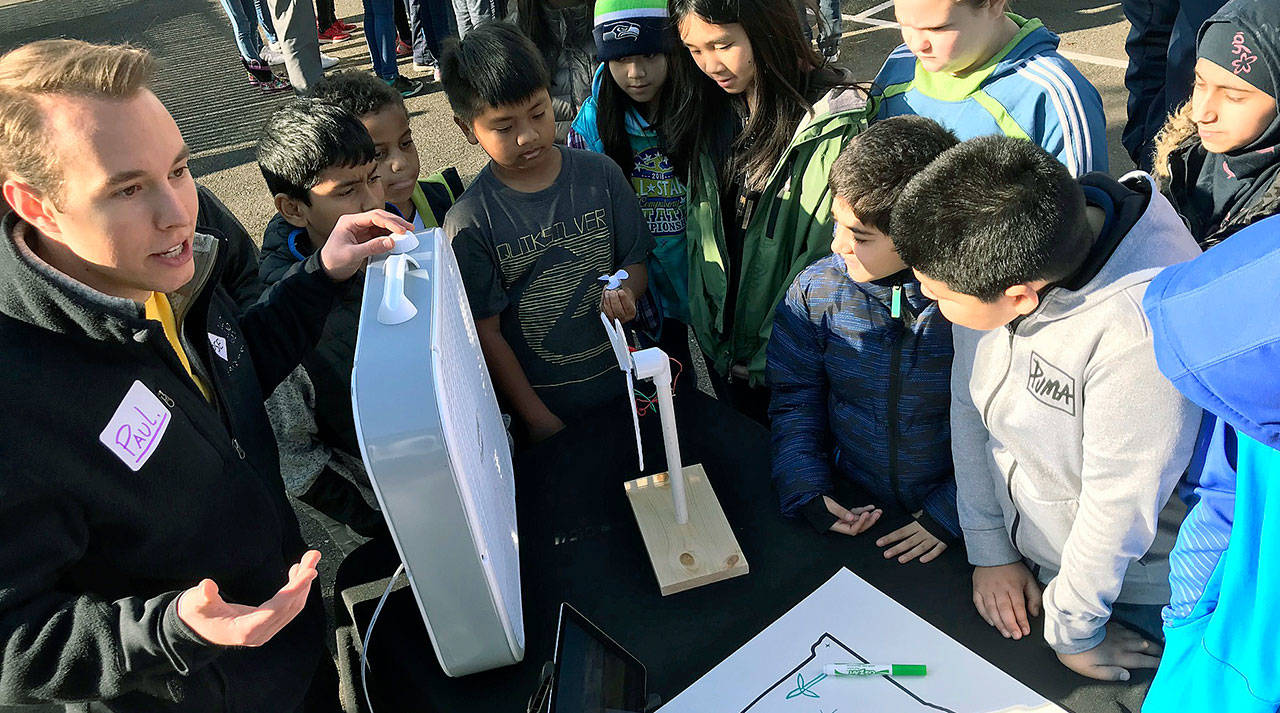 Puget Sound Energy’s Paul Leonetti explains how wind energy works to fifth-graders at Daniel Elementary School on Nov. 8. The demonstration was part of PSE’s visit to the East Hill school, coinciding with National STEM Day. MARK KLAAS, Kent Reporter.