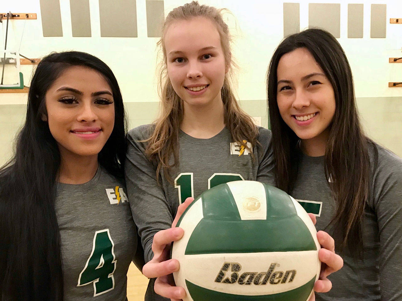 Senior standouts, from left, Zaiah “Zay” Calvin, Kate Wick and Austin Ibale have steered Kentridge on an undefeated course to the state volleyball tournament. MARK KLAAS, Kent Reporter