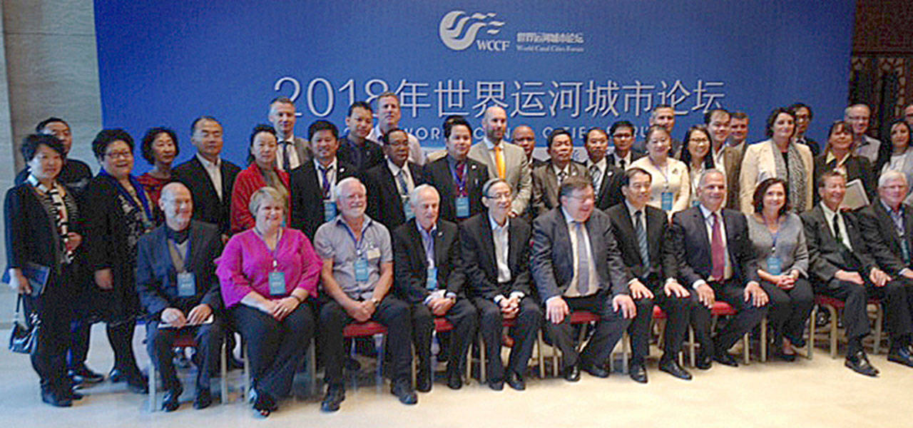 Kent Mayor Dana Ralph, seated second from left front row, attended the World Canal Cities Forum in October in Yangzhou, China, a sister city of Kent. COURTESY PHOTO, City of Kent