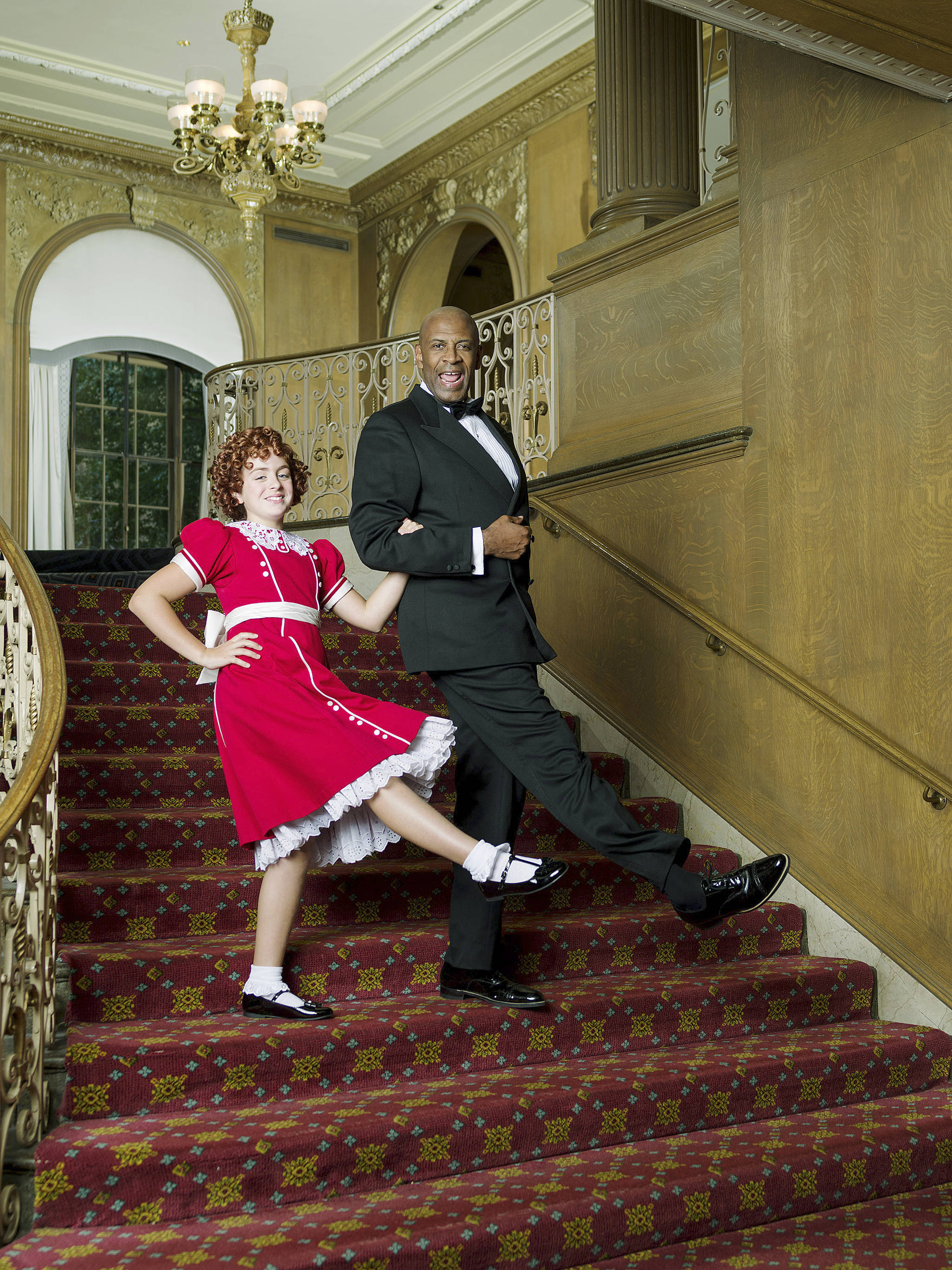 Faith Young as Annie, with Timothy McCuen Piggee as Daddy Warbucks in the 5th Avenue Theatre’s production of “Annie.” COURTESY PHOTO, Mark Kitaoka
