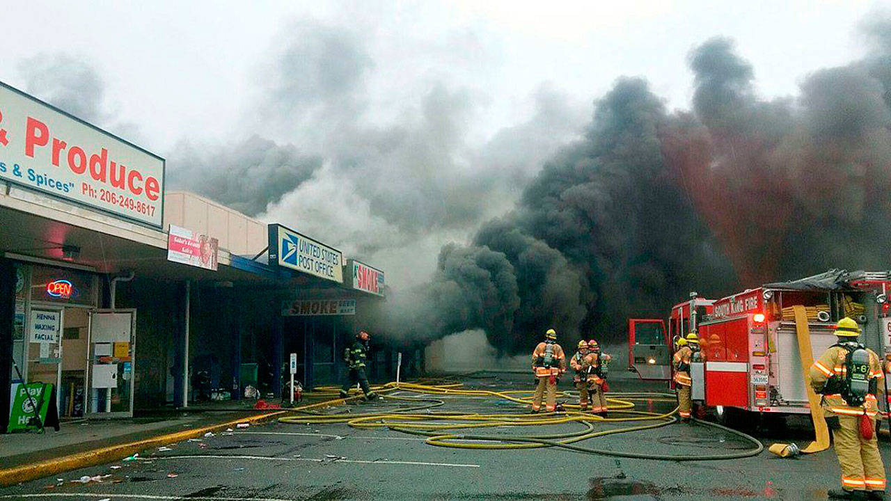Firefighters respond in November 2016 to a strip mall fire on the West Hill in Kent. FILE PHOTO