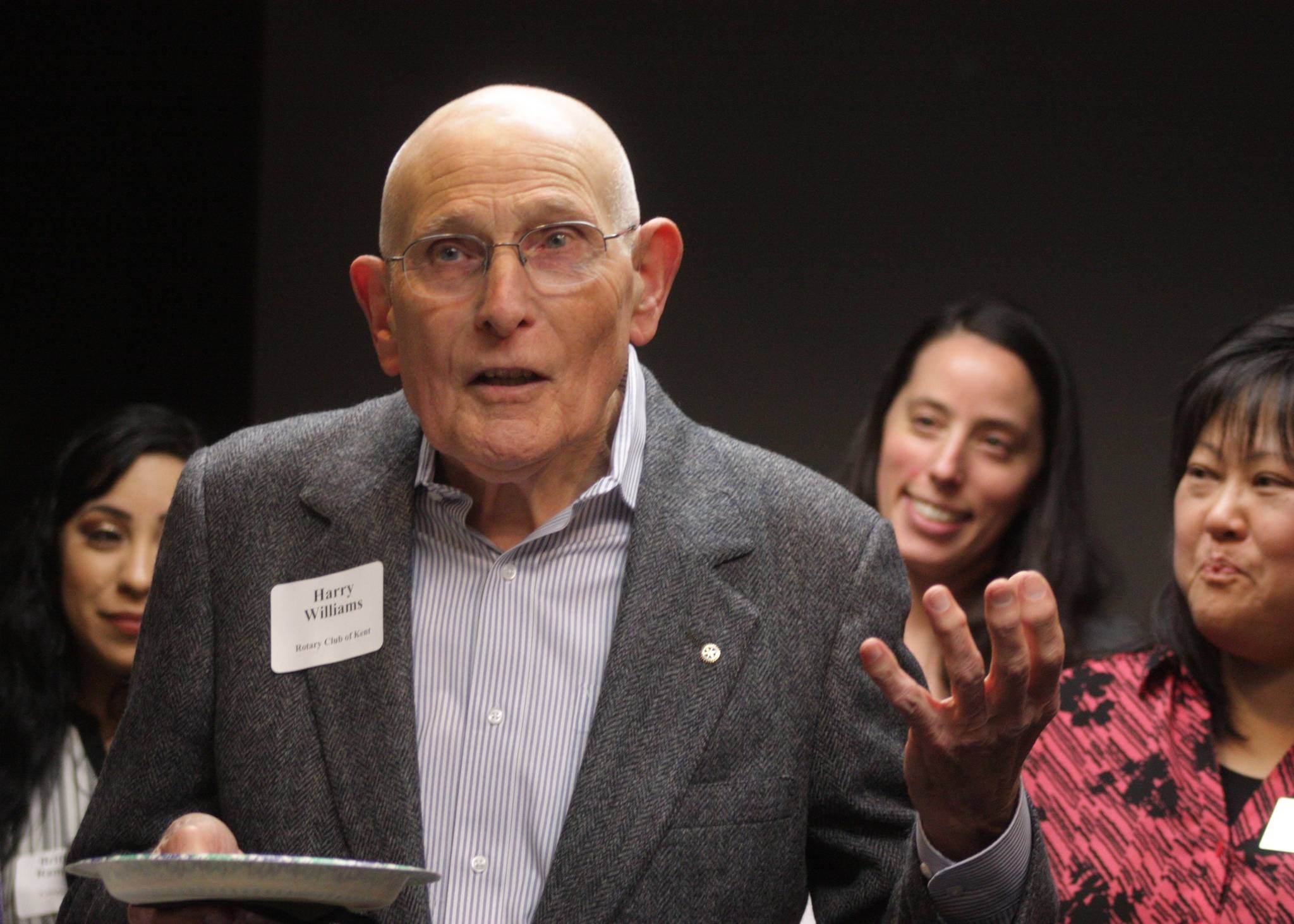 Harry Williams, past president and longtime member of the Kent Chamber of Commerce, talks to members during the chamber’s 70th birthday celebration last week. MARK KLAAS, Kent Reporter