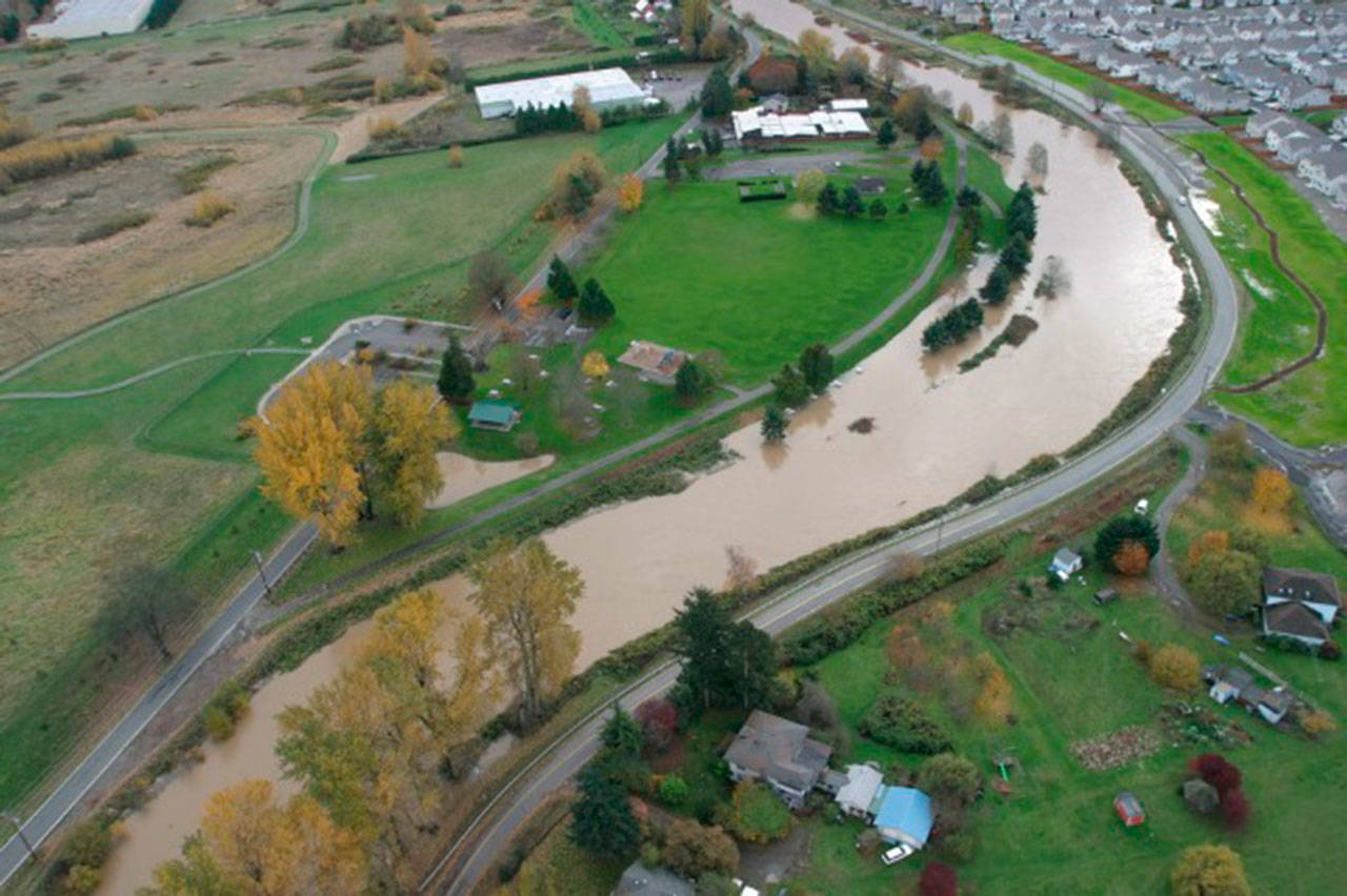 Looking south along the Lower Russell Road levee on the Green River during a 2006 high-water event. COURTESY PHOTO, City of Kent