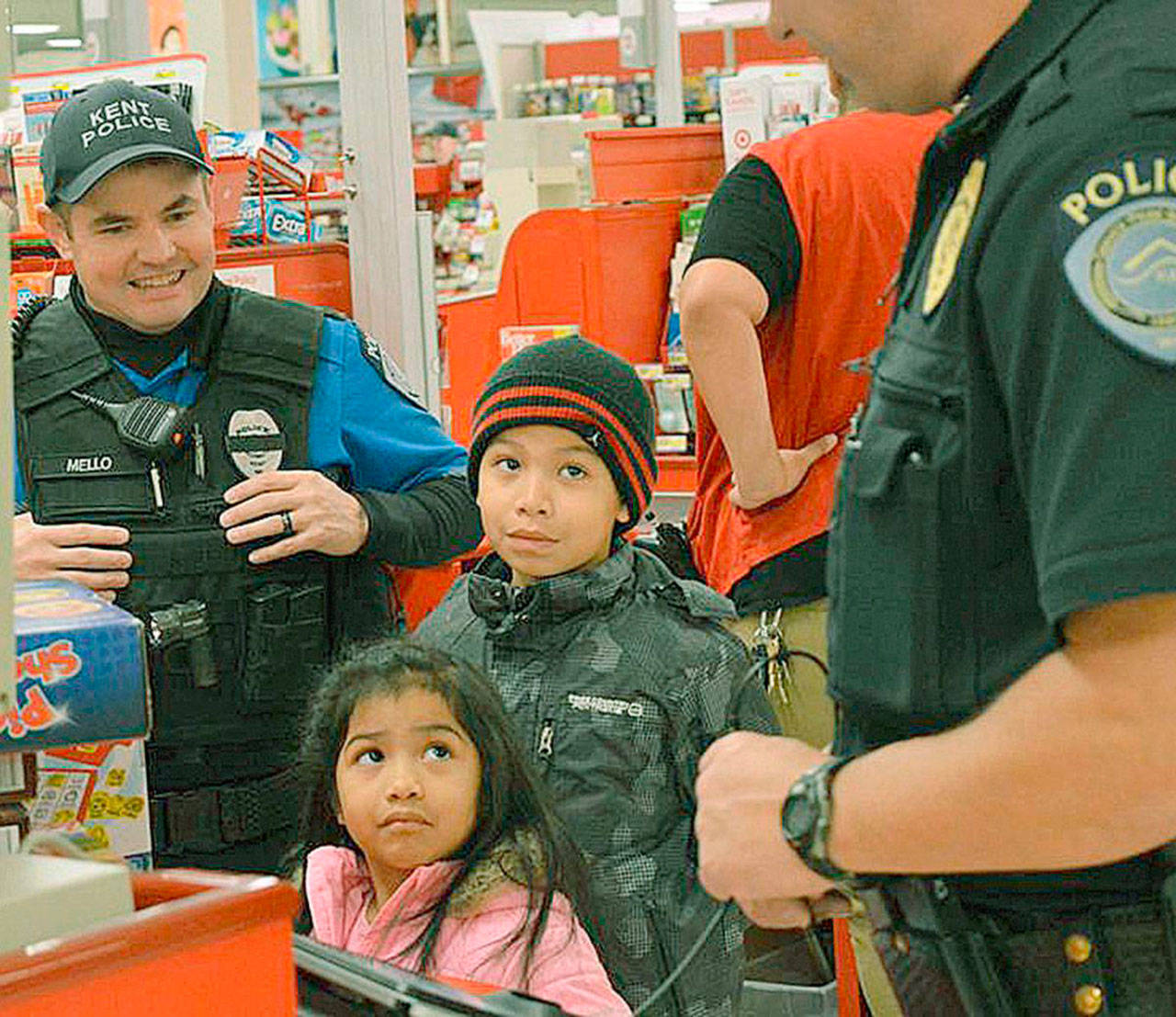 Children shop at Target with Kent Police officers to buy holiday gifts. FILE PHOTO 2016