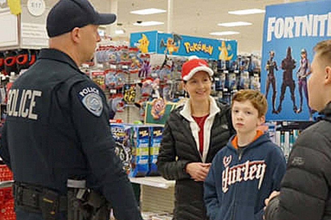 Children shop with a cop at Kent Target store