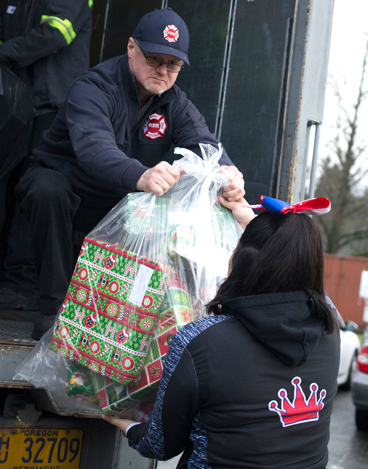 Firefighters and volunteers collected thousands of toys for families in need during the Toys for Joy program this season. COURTESY PHOTO, Puget Sound Regional Fire Authority