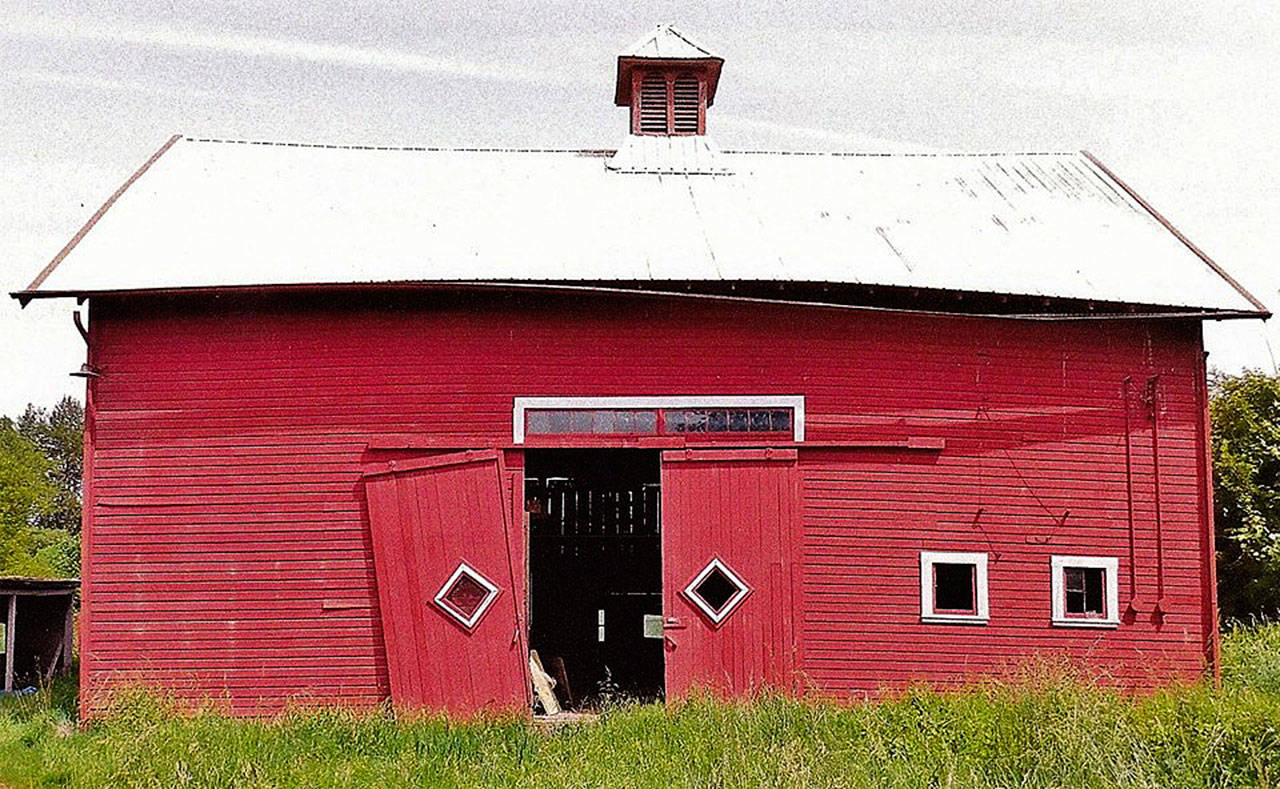 The city of Kent has hired a contractor to move the historic Dvorak Barn to preserve it and make way for the expanded Lower Russell Road levee project along the Green River. COURTESY PHOTO, Save the Dvorak Barn