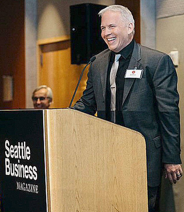 Torklift President Jack Kay accepts the Family Business of the Year award from Seattle Business magazine. COURTESY PHOTO, Torklift