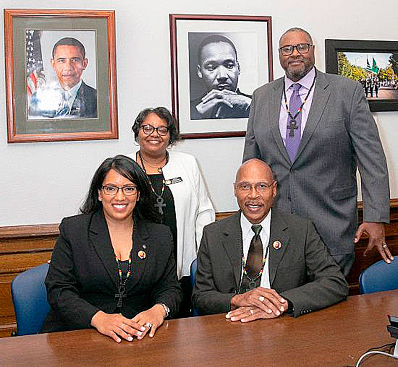 Black Caucus members of the state Legislature, from left: Reps. Kristine Reeves, Debra Entenman (of Kent), John Lovick and Eric Pettigrew. Not pictured: Rep. Melanie Morgan. COURTESY PHOTO, LSS Photography