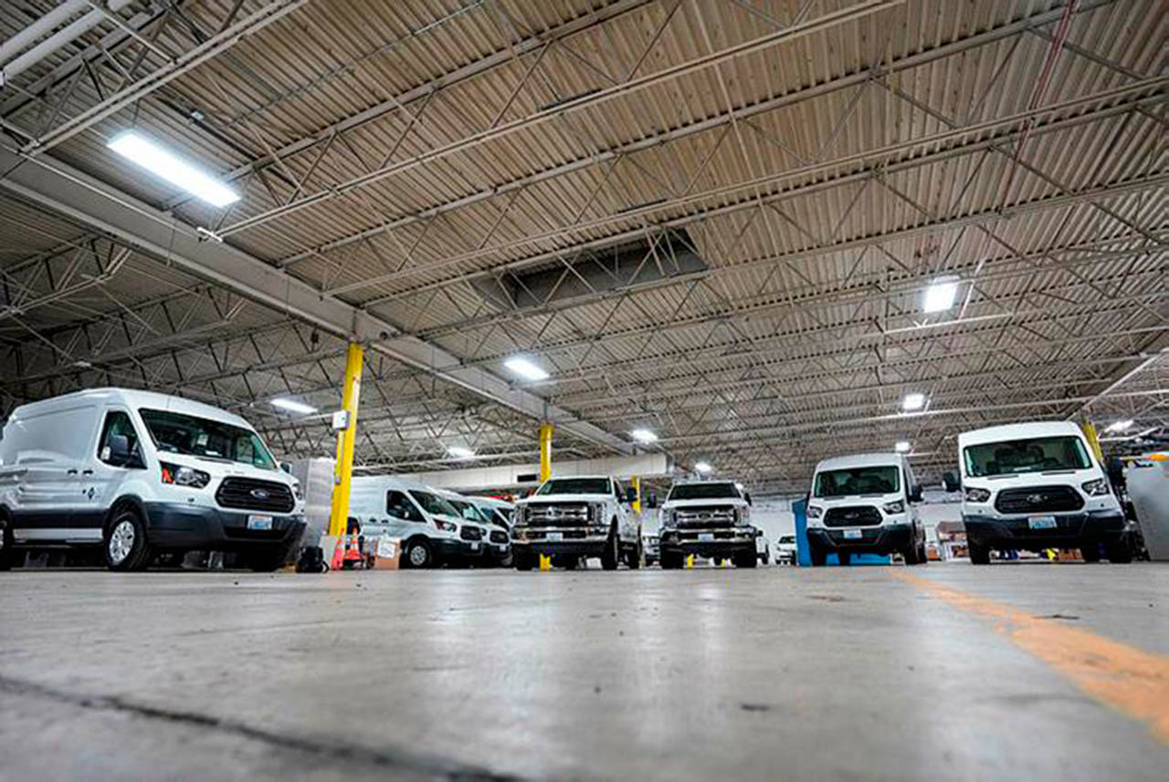 PSE welcomes a fleet of F-250 trucks converted into hybrids. COURTESY PHOTO, PSE