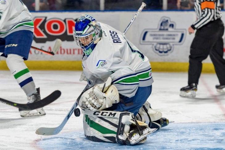 Thunderbirds goalie Roddy Ross deflects the puck, one of 46 saves he made in the WHL win over the Silvertips at the accesso ShoWare Center on Saturday night. COURTESY PHOTO, Brian Liesse, T-Birds