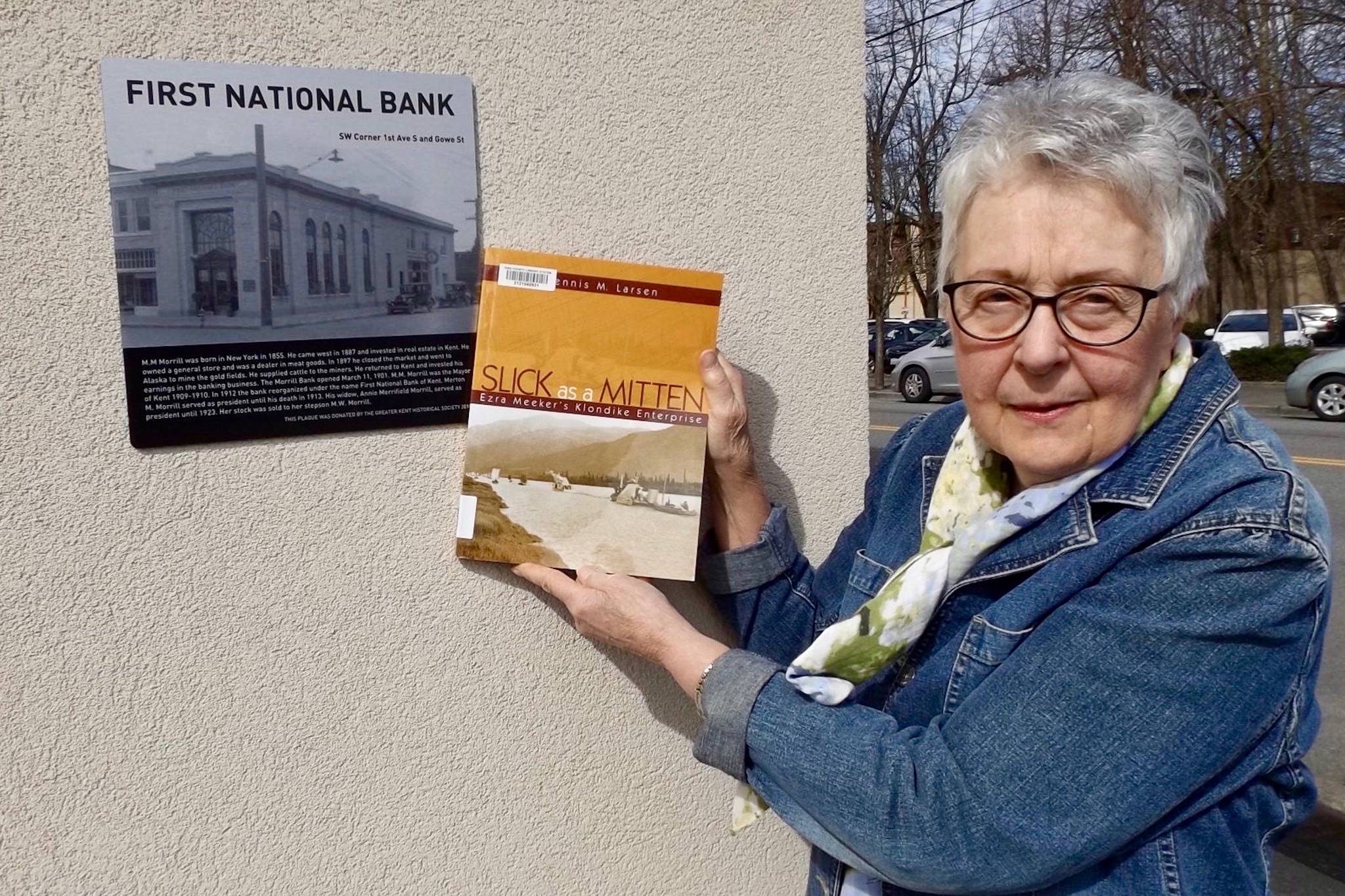 The Kent Historical Museum’s Nancy Simpson displays “Slick as a Mitten,” the book that will be discussed in the April 13 Bookmarks Landmarks program in Kent. COURTESY PHOTO, SoCoCulture