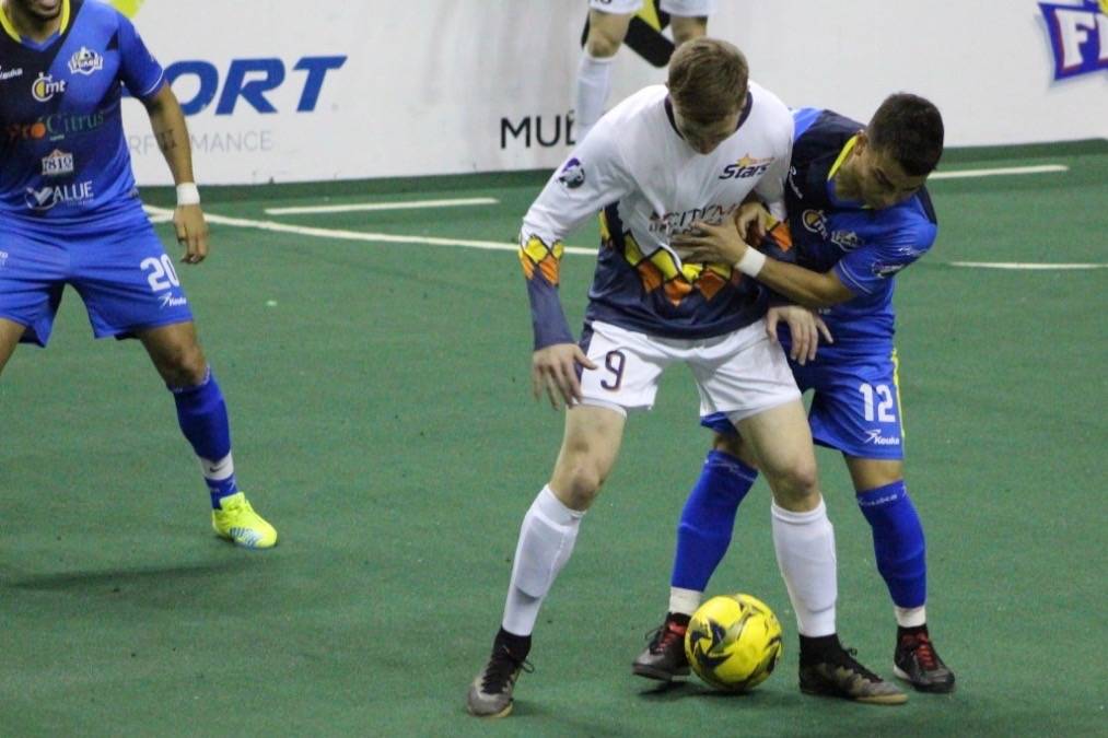 The Stars Derek Johnson (9) and a Flash player battle the ball during MASL play Sunday. COURTESY PHOTO, Stars