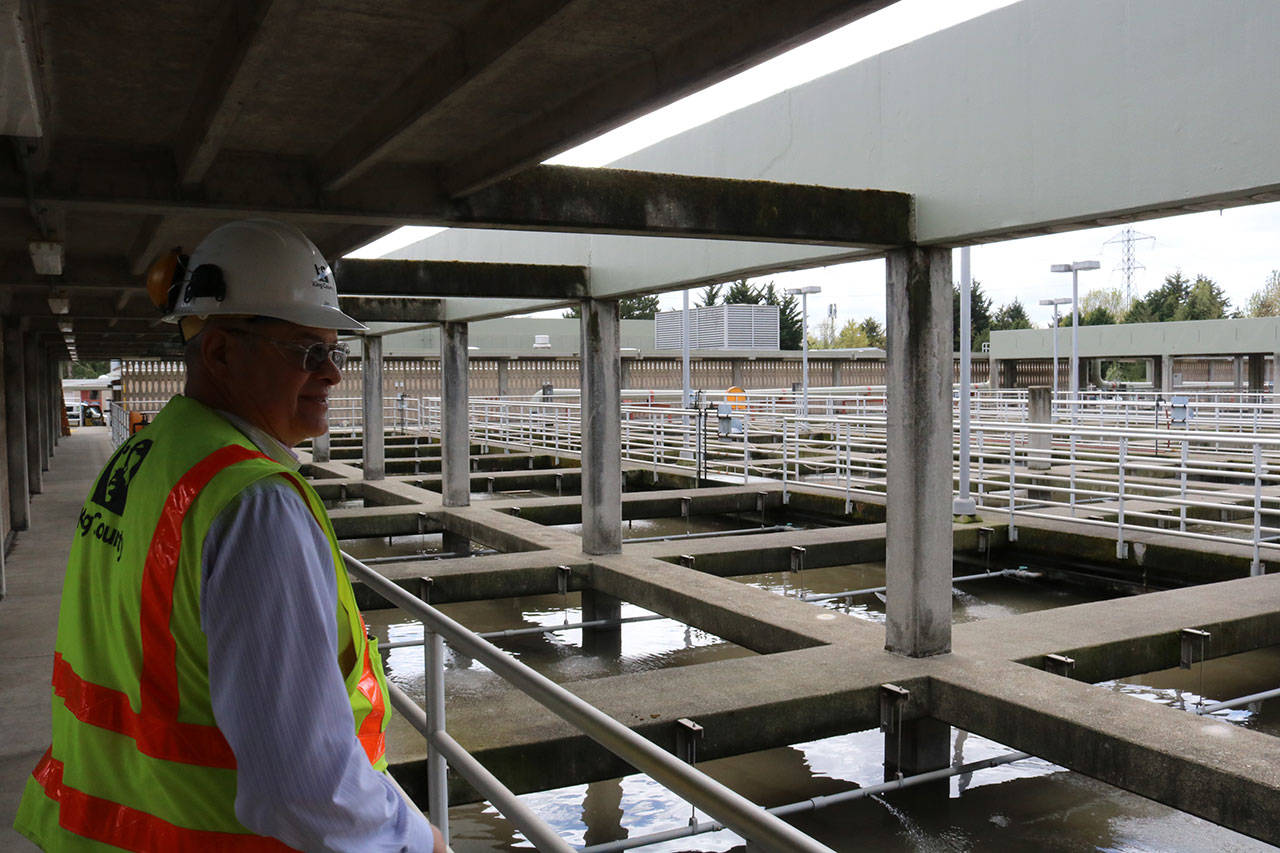 Jim Pitts stands on walkway overlooking filtration chambers at the King County South Treatment Plant in Renton. Aaron Kunkler/staff photo