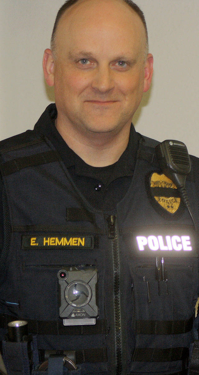 Kent Police Assistant Chief Eric Hemmen displays a body-worn camera. STEVE HUNTER, Kent Reporter