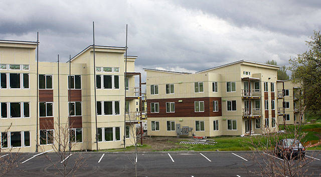 A nearly 500-unit Marquee on Meeker apartment complex is under construction at the former Riverbend par 3 golf course property. FILE PHOTO