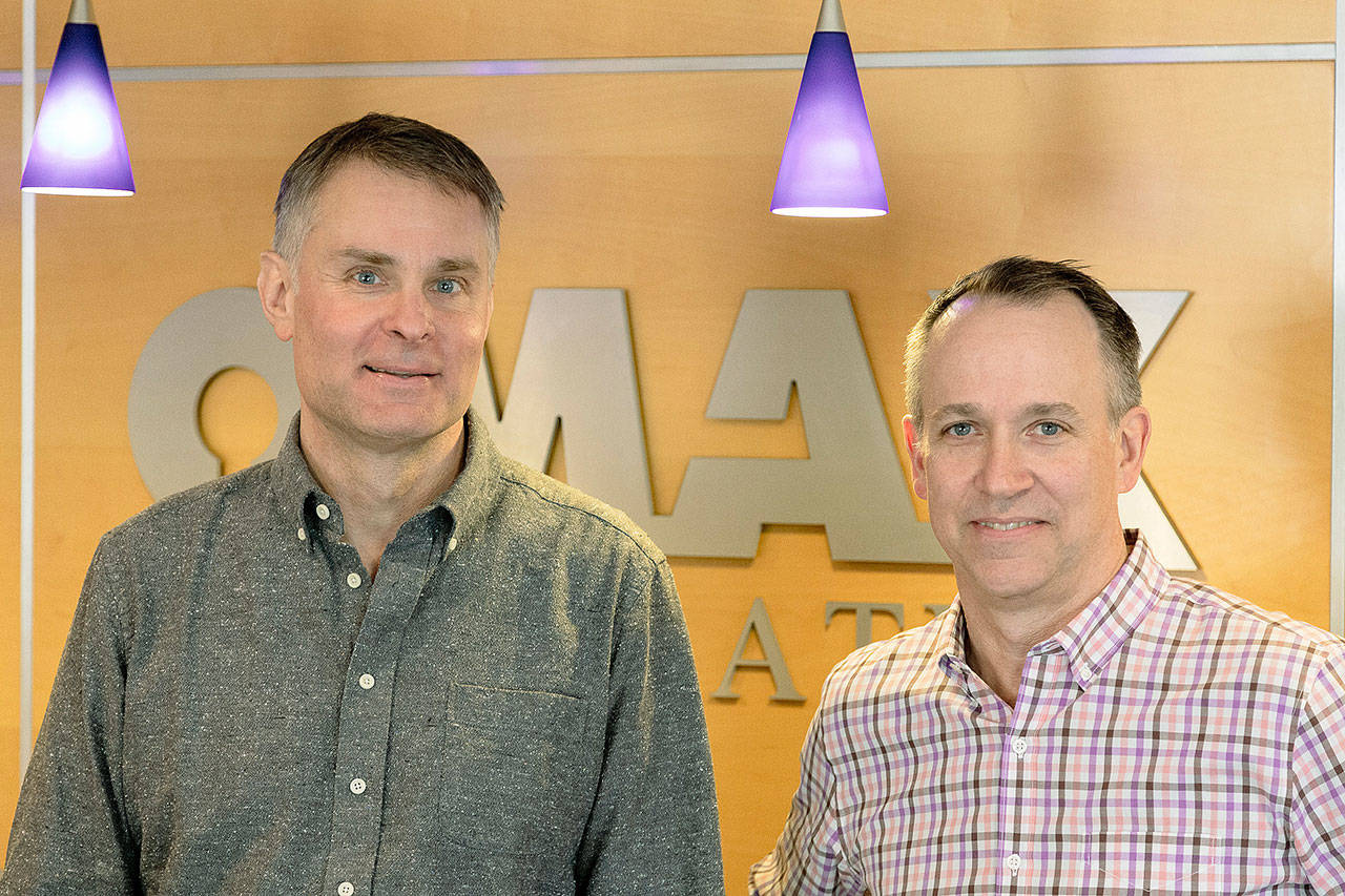 Mike Ruppenthal, left, is the new general manager at OMAX, and Steve Ulmer has a new role as vice president of sales. COURTESY PHOTO, OMAX