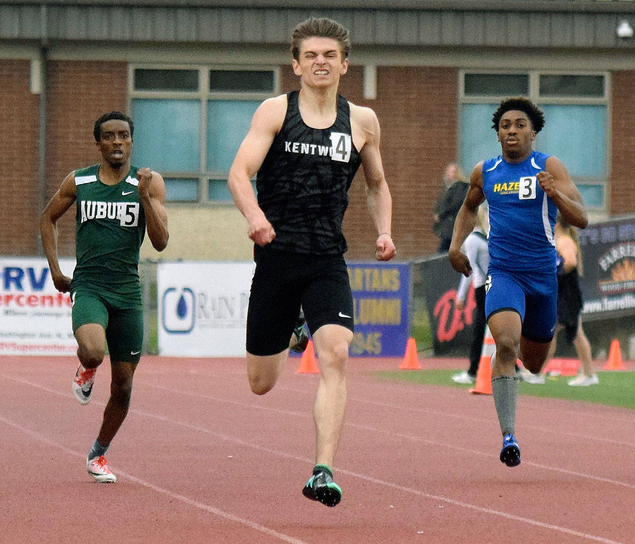 Kentwood’s Daniel Gaik darts to the finish line in his 400-meter heat at the bi-district meet on May 16. Gaik qualified for state with the second-best time of 49.62 seconds. RACHEL CIAMPI, Kent Reporter
