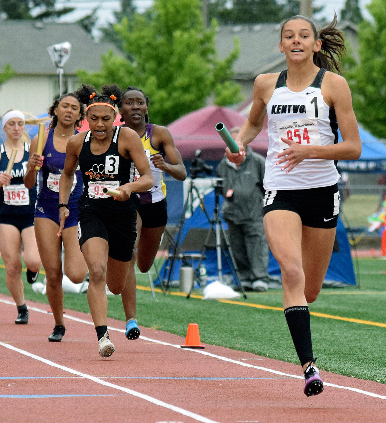 Kentwood’s Emma Pollak brings home the victory in the girls 800-meter relay at the 4A finals last Saturday. RACHEL CIAMPI, Kent Reporter