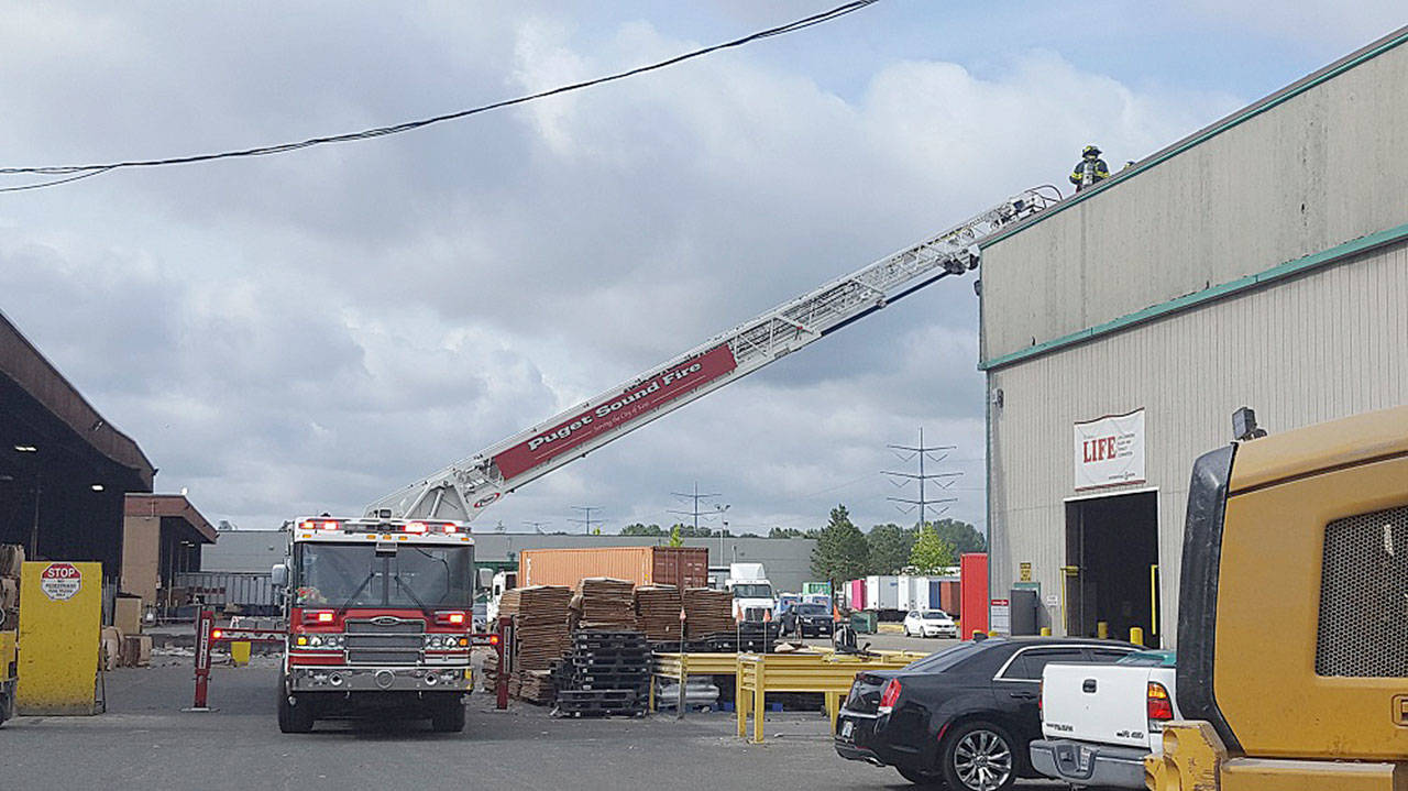 Kent firefighters respond to a fire June 6 at IP Recycling, 1225 Sixth Ave. N. A sprinkler system helped keep the fire contained. COURTESY PHOTO, Puget Sound Fire