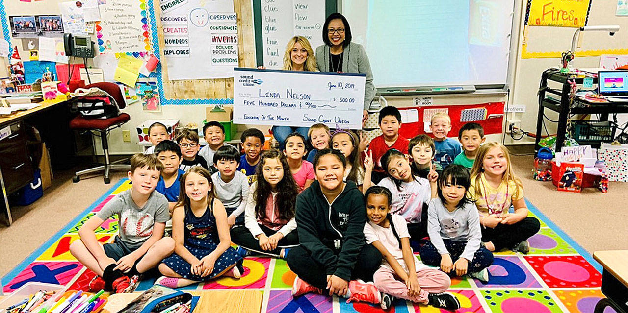 Carriage Crest Elementary School’s first-grade teacher Linda Nelson was the Sound Credit Union’s June Educator of the Month. Nelson won a $500 classroom scholarship and treats for her students. COURTESY PHOTO