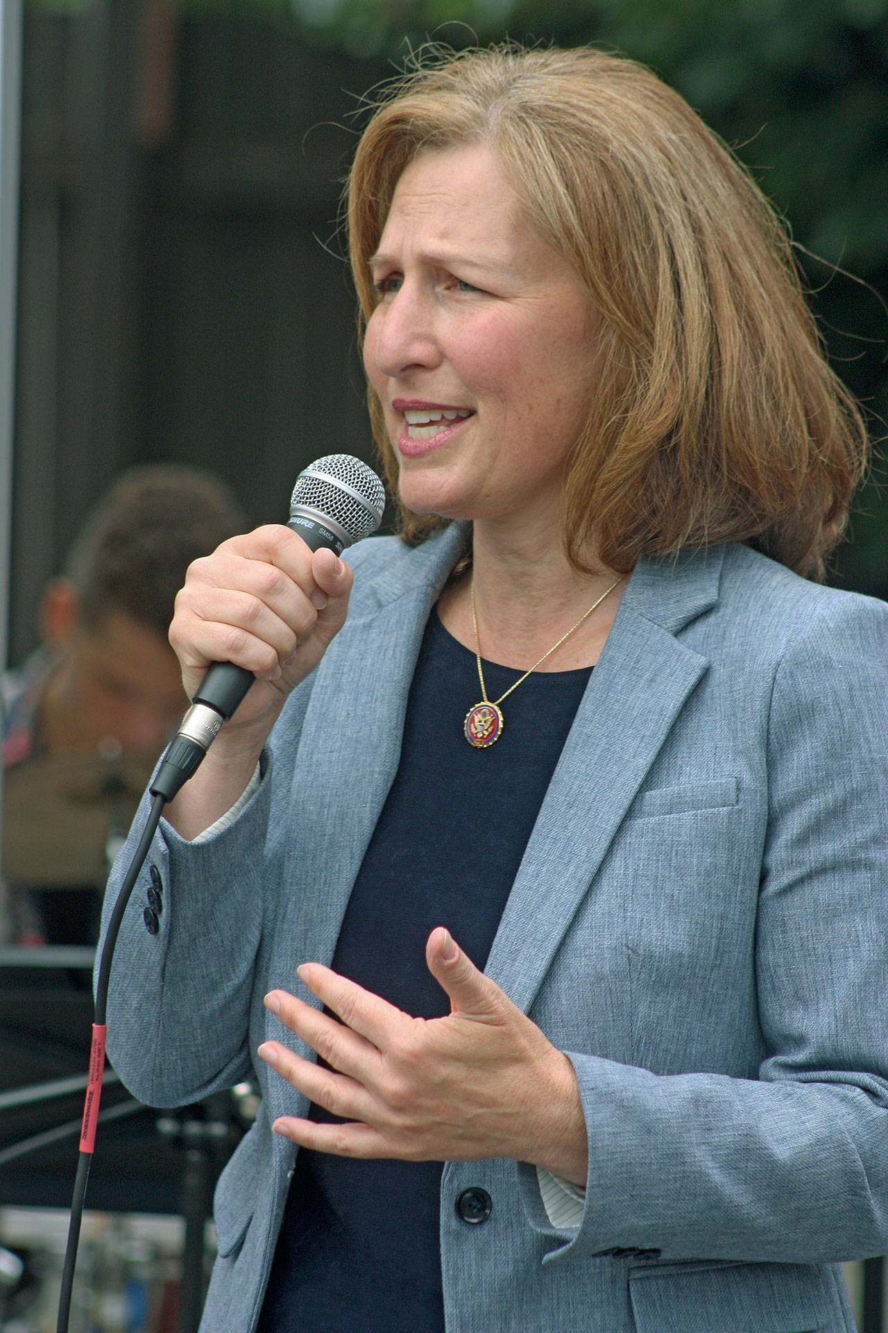 U.S. Rep. Kim Schrier, D-Wash., speaks to a gathering outside HealthPoint Auburn North on Thursday afternoon. The Congresswoman talked about the importance of childhood immunizations. MARK KLAAS, Kent Reporter