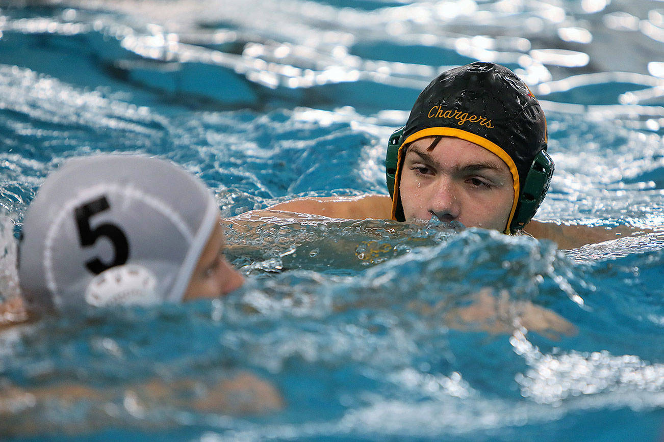 Kentridge junior Marc Midrigan staring down his Lakes opponent. COURTESY PHOTO, Tracy Arnold