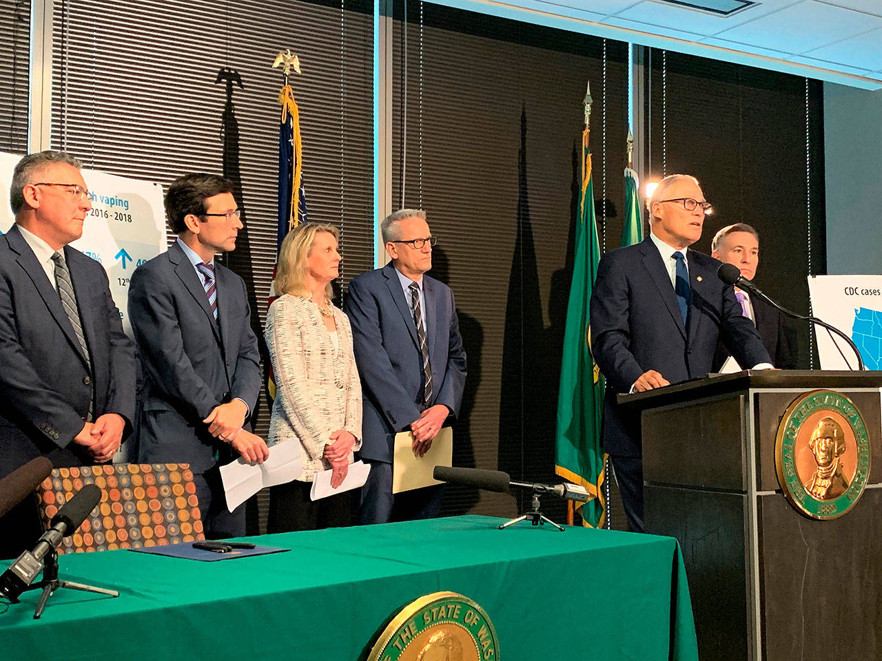 From left to right: Liquor and Cannabis Board Director Rick Garza, Attorney General Bob Ferguson, Sen. Patty Kuderer, Washington State Dept. of Health Secretary John Wiesman and Gov. Jay Inslee speak at a Seattle press conference Friday about changes to how the state regulates the vaping industry in light of a recent health crisis. COURTESY PHOTO, Office of the Governor