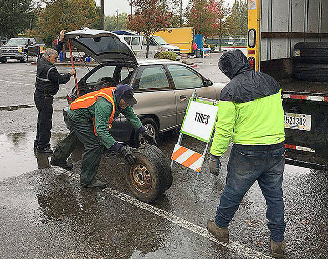 A man drops off tires at the city of Kents Recycling Event on Oct. 19 at Hogan Park. COURTESY PHOTO, City of Kent