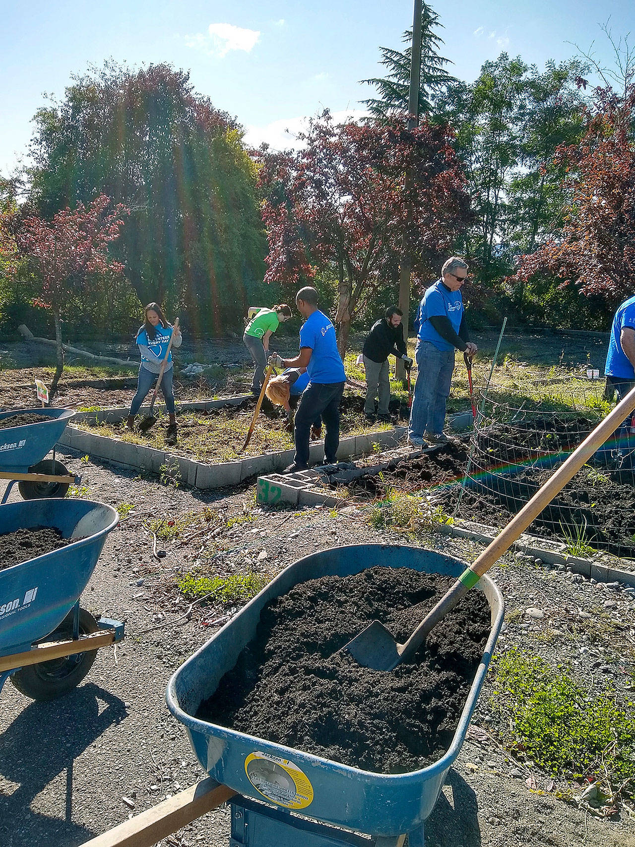 Boeing volunteers recently installed compost to the World Relief Hillside Parking Plots Community Garden in Kent. COURTESY PHOTO